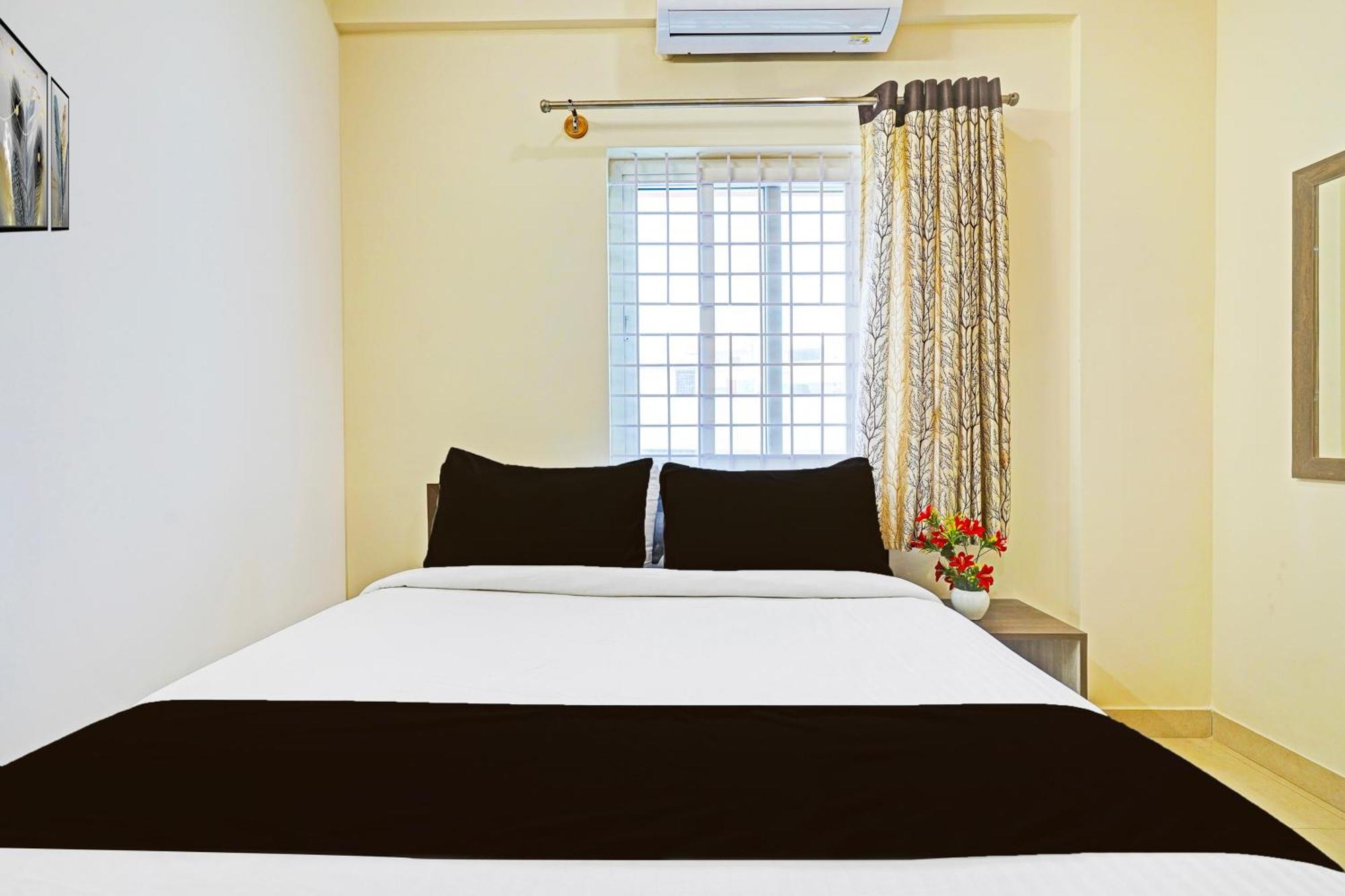 Hotel Super Collection O Niladri Road à Kammasandra Extérieur photo